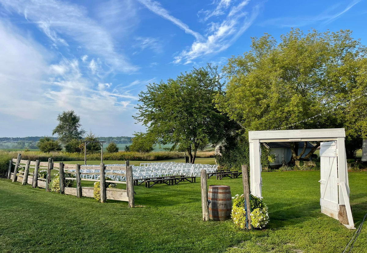 Outdoor farm wedding ceremony area at a rustic Oshkosh wedding barn